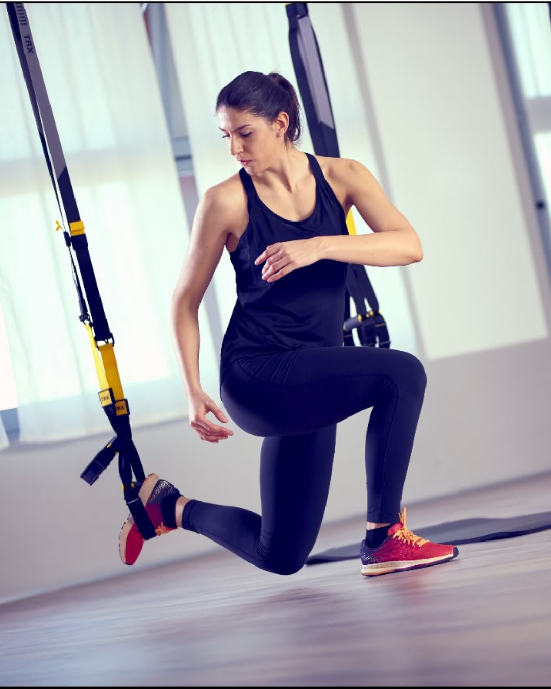 Allenamento equilibrio con TRX